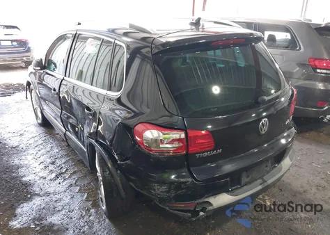 2014 Volkswagen Tiguan Sel z USA, uszkodzony, nr VIN WVGBV3AX0EW556316